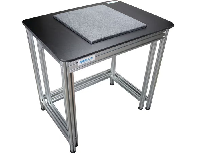 Adam Equipment anti-vibration balance table with granite top, aluminum frame, and black surface – ideal for precision lab use in Canada